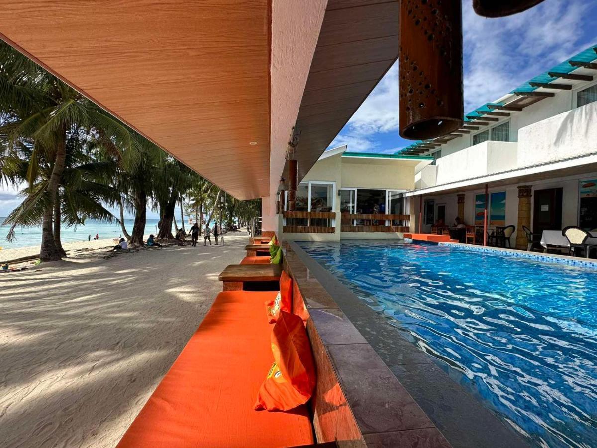 Calypso Beach And Dive Resort Manoc-Manoc Екстериор снимка