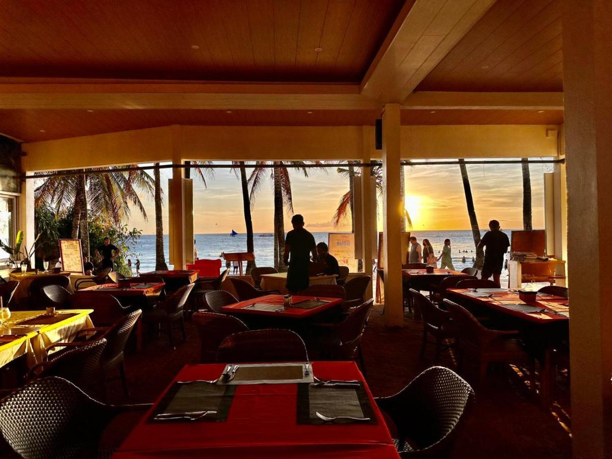 Calypso Beach And Dive Resort Manoc-Manoc Екстериор снимка