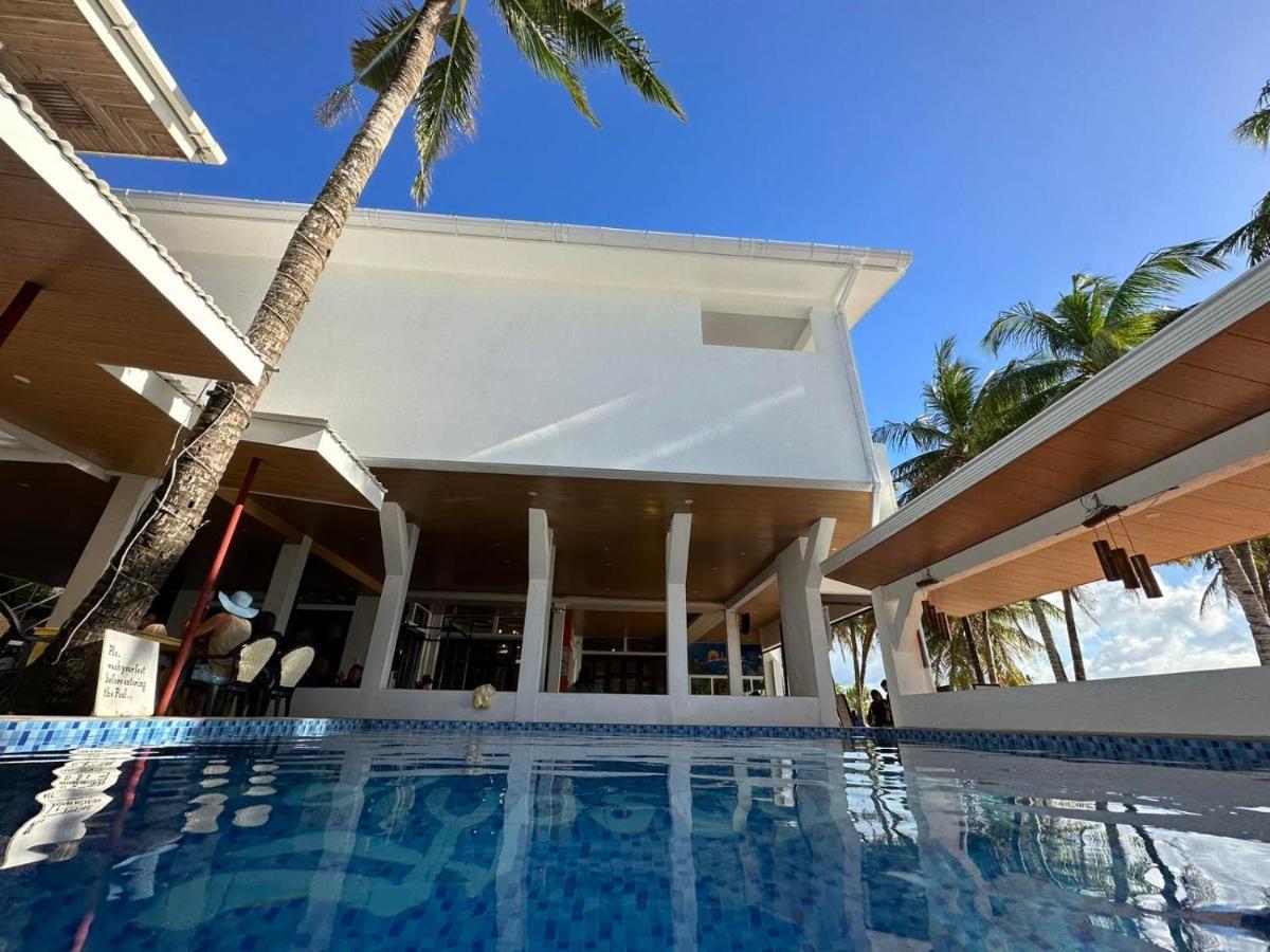 Calypso Beach And Dive Resort Manoc-Manoc Екстериор снимка