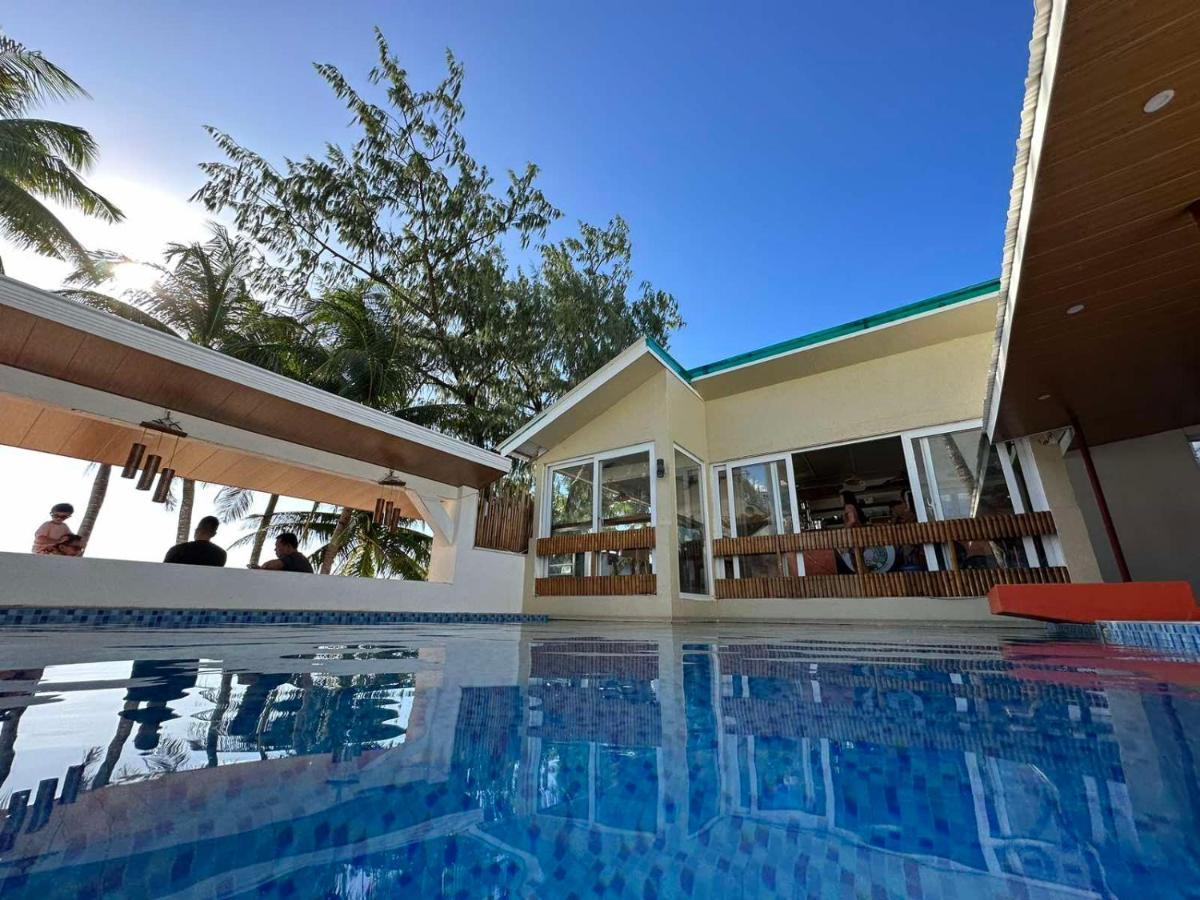 Calypso Beach And Dive Resort Manoc-Manoc Екстериор снимка