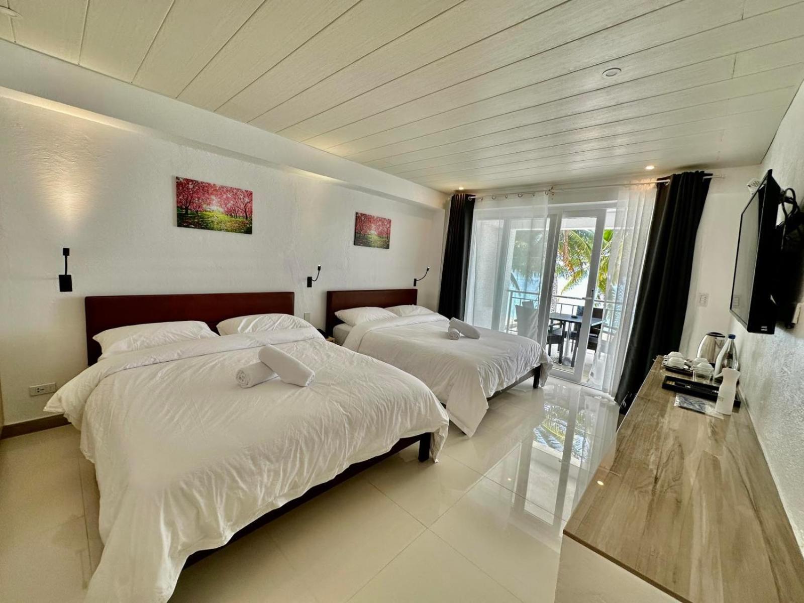 Calypso Beach And Dive Resort Manoc-Manoc Екстериор снимка
