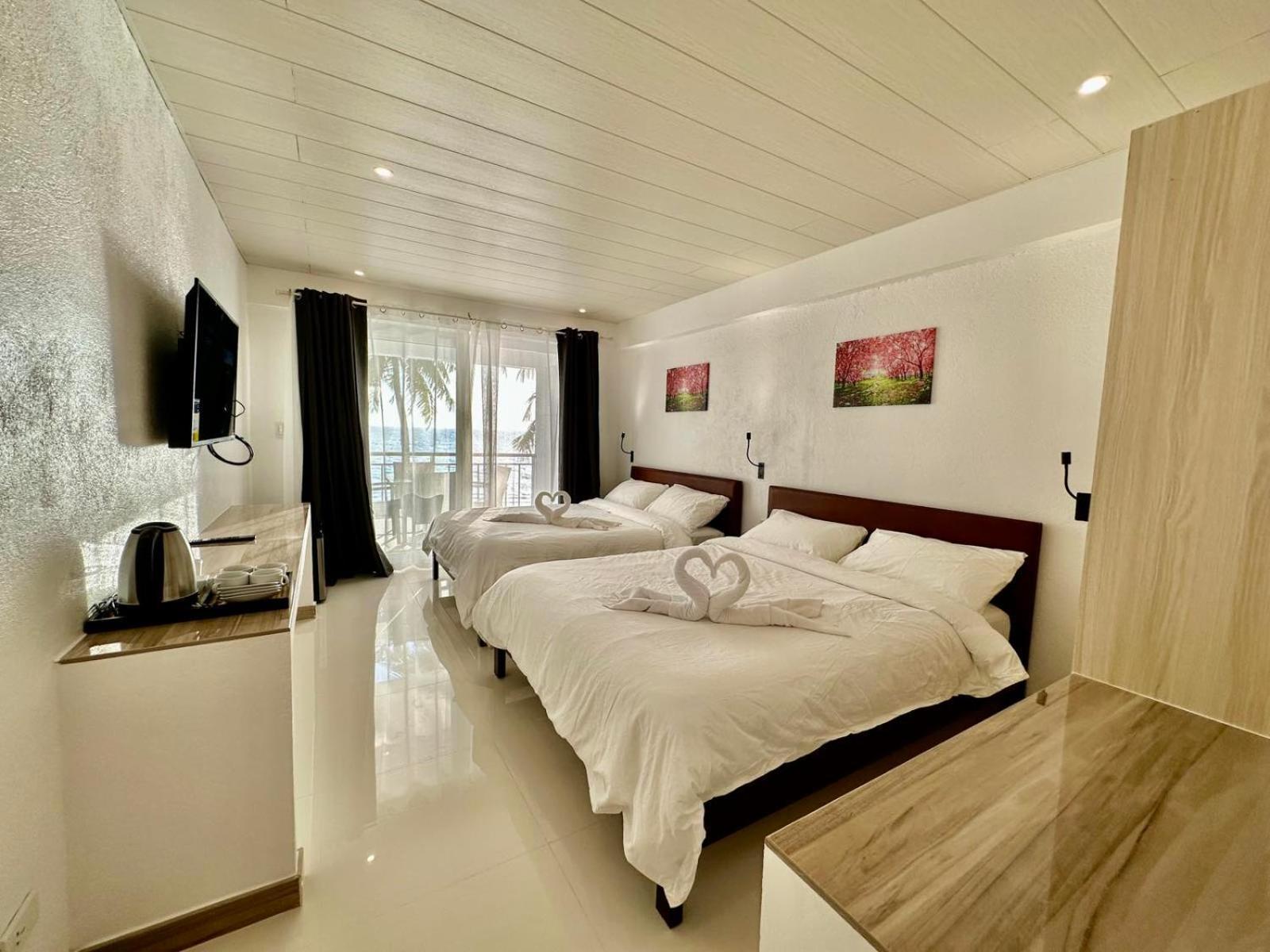 Calypso Beach And Dive Resort Manoc-Manoc Екстериор снимка